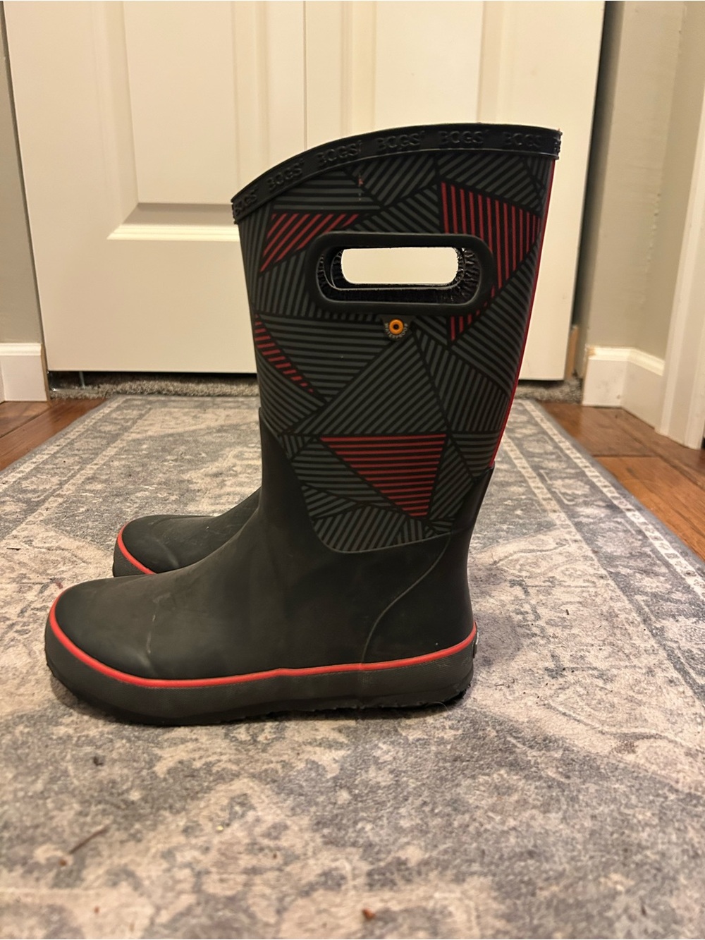 Bogs Black Rain Boots with Red Accent and Geometric Shaft